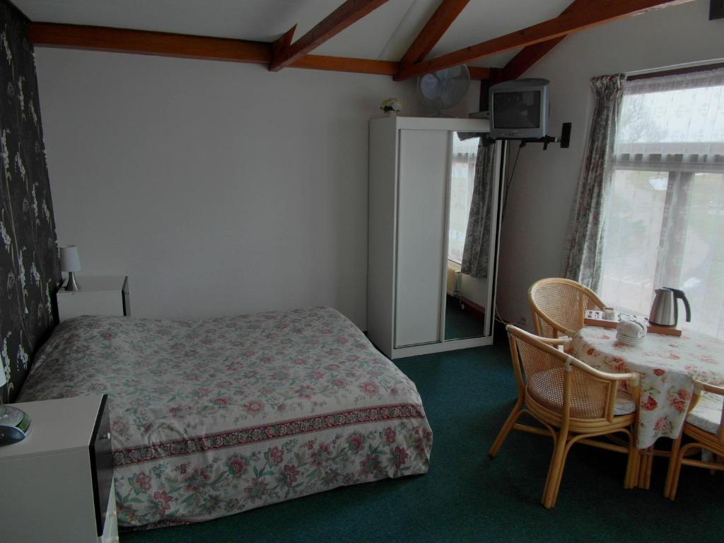 Pension Zonneweelde Oosthuizen Kamer foto